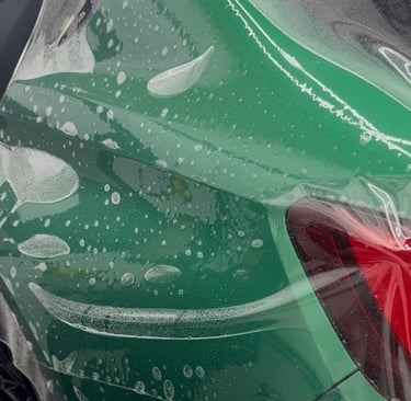 PPF installation on a BMW fender, showcasing Master-Level Precision.