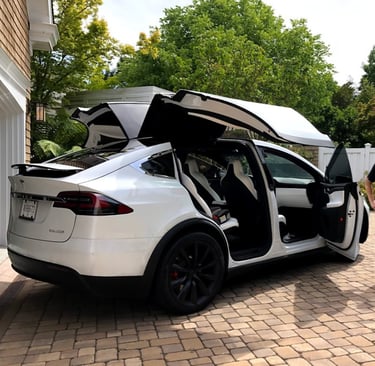 Completed Tesla Model X with 5% Ceramic Tint and all Falcon Wing Doors open,
