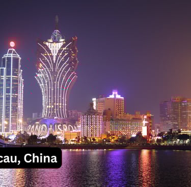 A dazzling night view of the Macau skyline, China, with the city's iconic casinos and hotels illumin