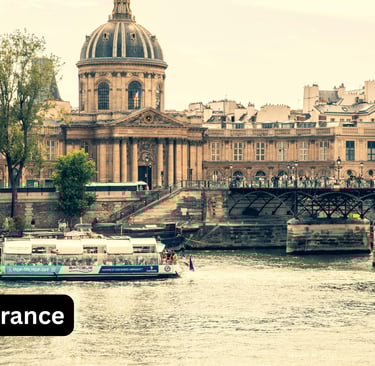 A beautiful day view of the Institut de France and the Pont des Arts bridge along the Seine River in