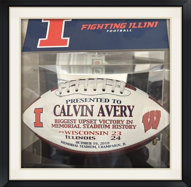 Calvin Avery received a game football for outstanding play against the Univ. of Wisconsin. 