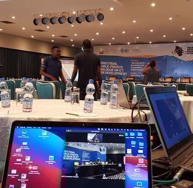 a laptop computer sitting on a table with a laptop on the table