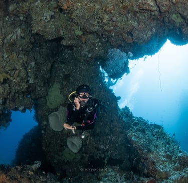 a scuba diver in a cave