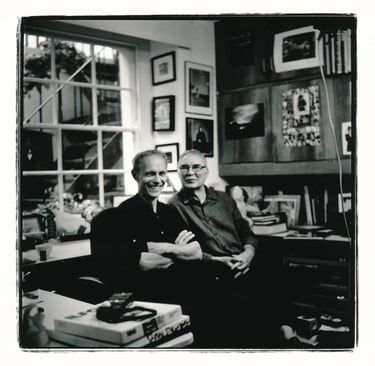 Adrian Ensor and Slawek Dejneka a black and white analogue picture of them sitting on chairs. Author: Slawek Dejneka