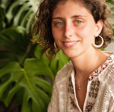 a woman with a large earring