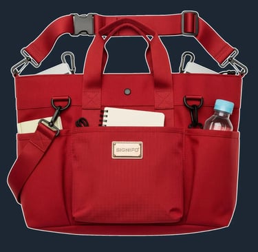 A large, rectangular, and soft-structured utility tote with multiple functional compartments.