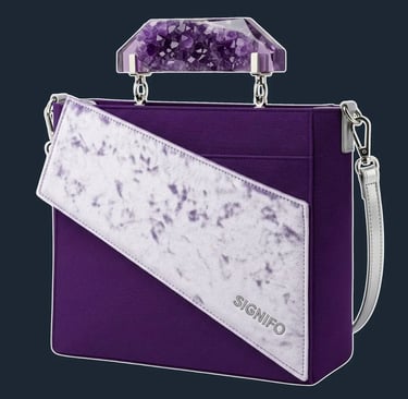 A sharp, geometric tote with an asymmetrical, angular flap, reminiscent of crystal facets.
