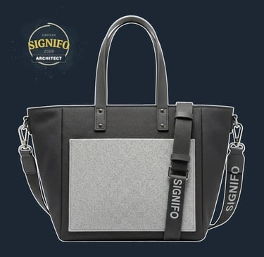 "A highly structured, geometric tote with a rigid, boxy form and sharp, defined corners.