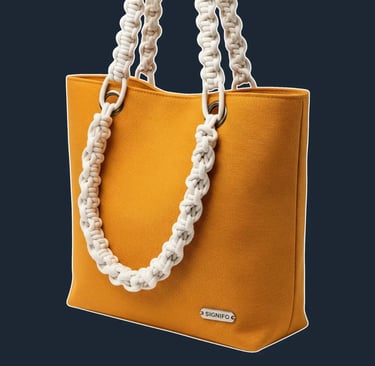 A minimalist east-west tote with a clean, sharp silhouette and an open top, its structure maintained by the hardfinish fabric