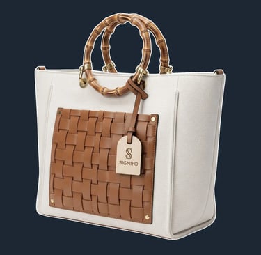 A structured, open-top 'shopper' tote with a wide, stable base.