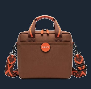 A modern, boxy 'camera bag' style tote with a zip-around top closure and a very clean, geometric form
