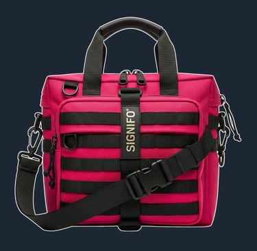 A modular, rectangular tote with a functional, multi-pocket 'tech-panel' design on the front.