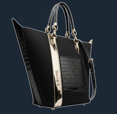 A sharply structured, north-south tote with a tapered silhouette and pointed 'bat-wing' side gussets.