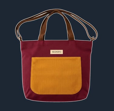 A soft, unstructured, north-south tote with a slouchy silhouette and a simple, open top.