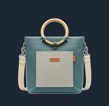 A minimalist tote with a clean, upright, rectangular shape, featuring an innovative folded construction that minimizes visibl