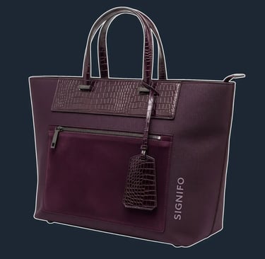 A large, structured tote with multiple layered panels on the front, creating a sense of depth and complexity.