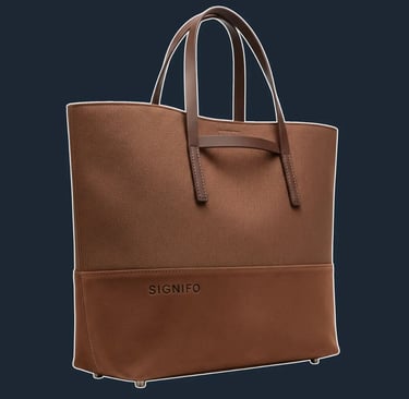 A sleek, minimalist north-south tote with a clean, seamless appearance and an open top.