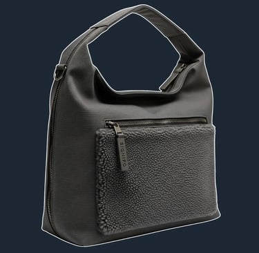 A large, slouchy, and unstructured hobo-style tote that drapes and folds.