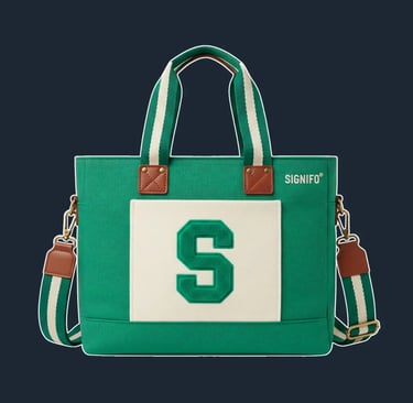 A sturdy, rectangular tote bag with a reinforced base, in a classic 'book tote' silhouette.