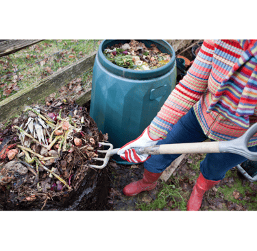 Turning the compost pile