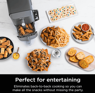 airfryer with a bunch of food items sitting on a table
