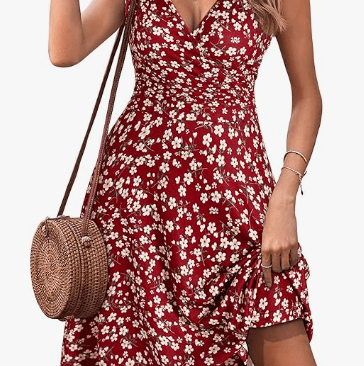 a woman in a red dress with a straw hat