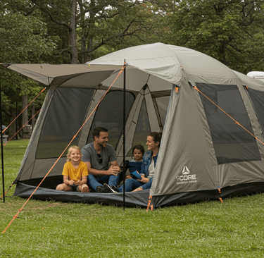 Family enjoying a spacious and easy setup tent at a scenic US National RV campsite.