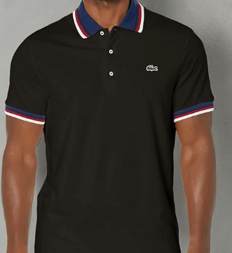 a man in a black shirt and white pants