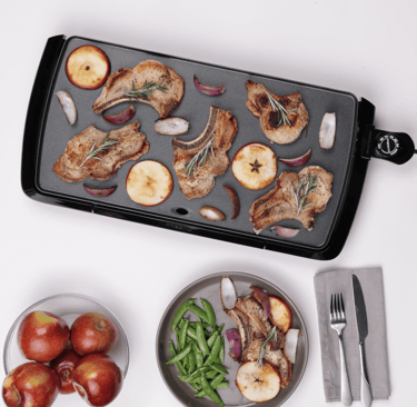 a pan of food with a pan of food on a table