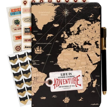 a couples travel notebook with a map of the world