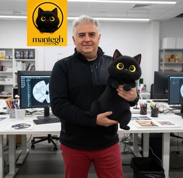 David Mantegh holding the Mantegh Studio mascot.