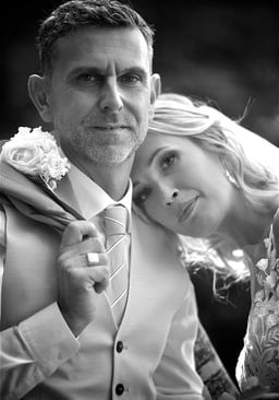 a man and woman posing for a photo