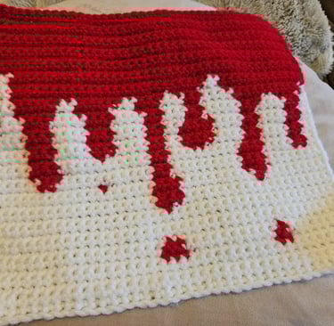 a crochet tapestry of blood dripping