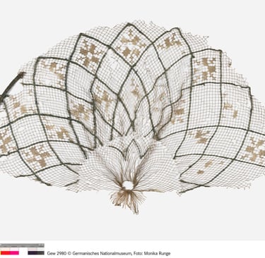 a cutting of a vintage filet crochet hairnet