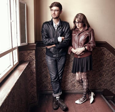 Band Fenster photographed in a staircase in an old building.