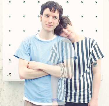 Outdoor double portrait of a band.