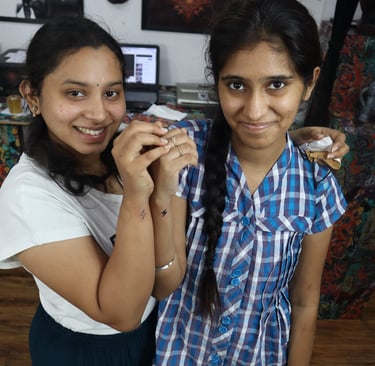 Best friends matching tattoos on wrists at Dudo’s Tattoos in Hyderabad