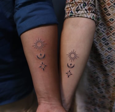 best friends matching tattoos on arm at Dudo’s Tattoos in Hyde