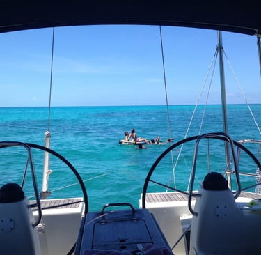a boat with people on it in the ocean