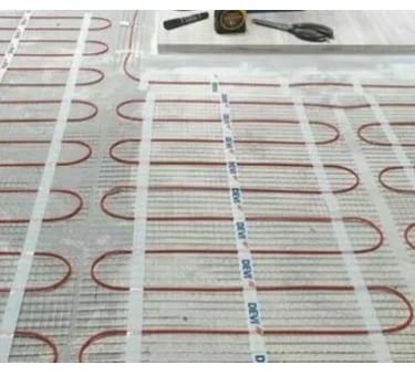 underfloor heating element installations by sparky G Ltd on construction site new build house