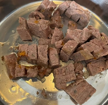Close up of Edgard & Cooper Game & Duck wet food showing texture