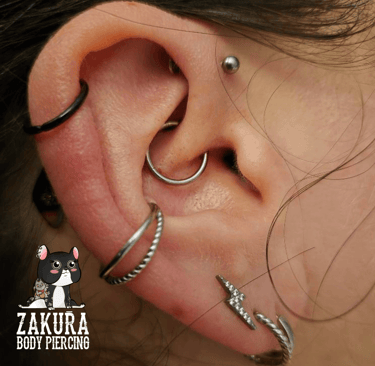 piercing à pau daith anti-helix lobe