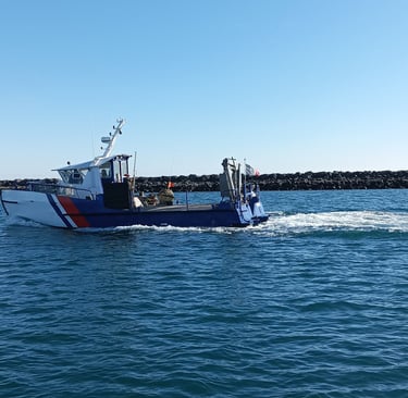 A local fishing boat returning to Cap d'Agde port.