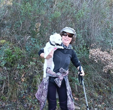 Mme Carabas and her dog Ondine.