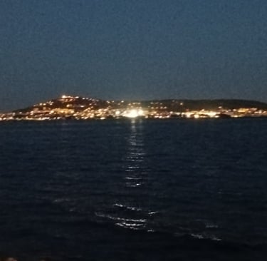 Lights shine from Mont St Clair, Sète
