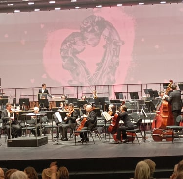 The Orchestra begins to assemble for the Valentine's Concert.