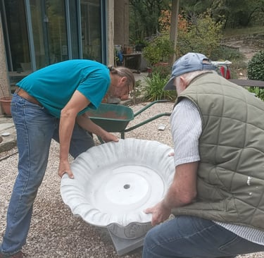 Setting the heavy fountain base in place