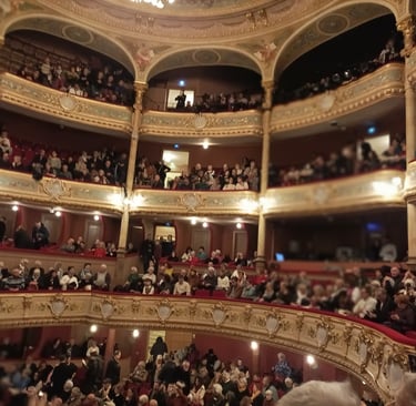 The audience gathers