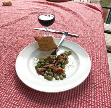 Broad beans, olive oil and bacon