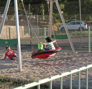 Smaller children play